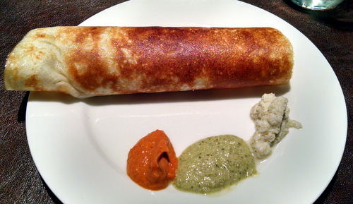 dosa stuffed with bean mash, served with chutneys